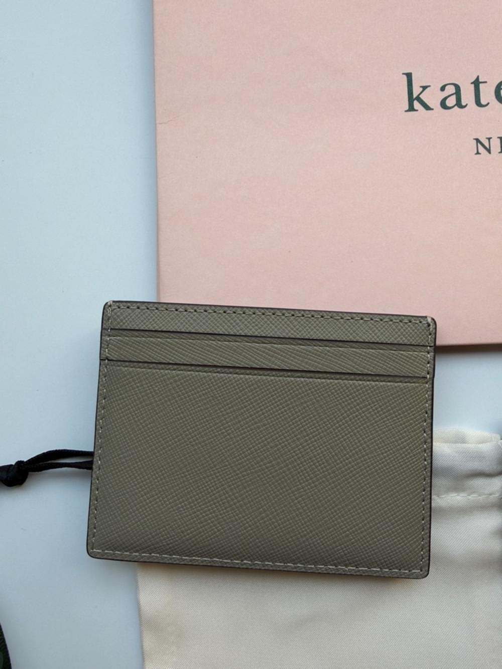 kate spade card holder & passport wallet with gold logo in oyster shell color - Picture 6 of 14